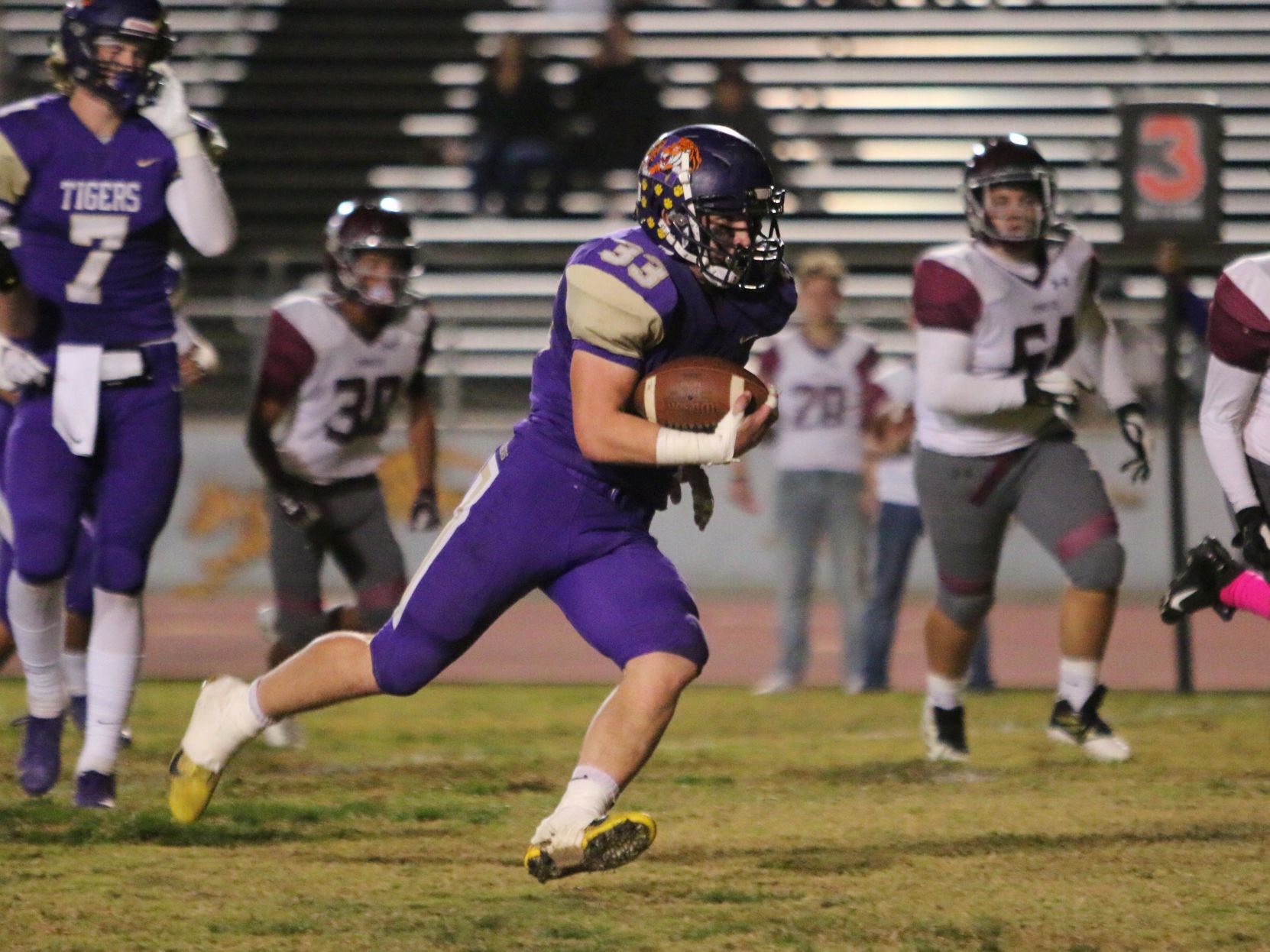 Tigers stay hot with 42-6 rout of Pioneers, clinch playoff spot